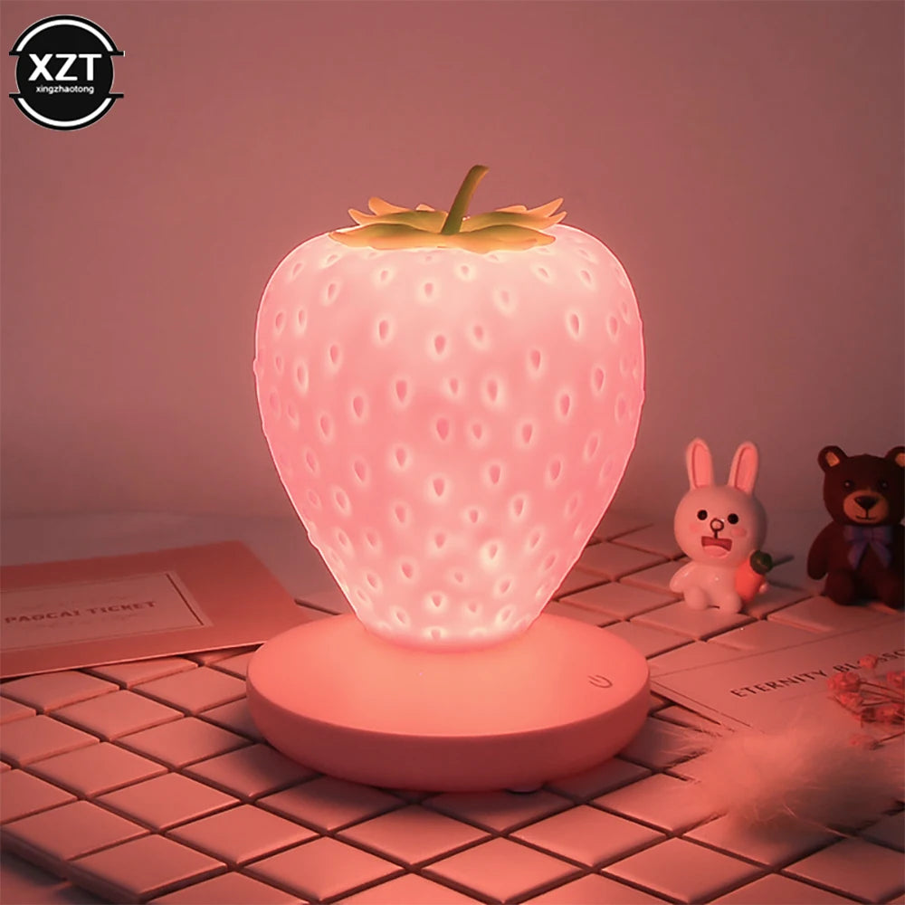 Strawberry Children Sleep Bedside Table Lamp USB Battery shown as soft ambient home lighting