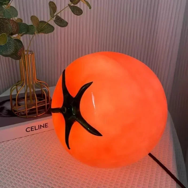 2024 Tomato Dining Bedside Table Lamp shown as soft ambient home lighting