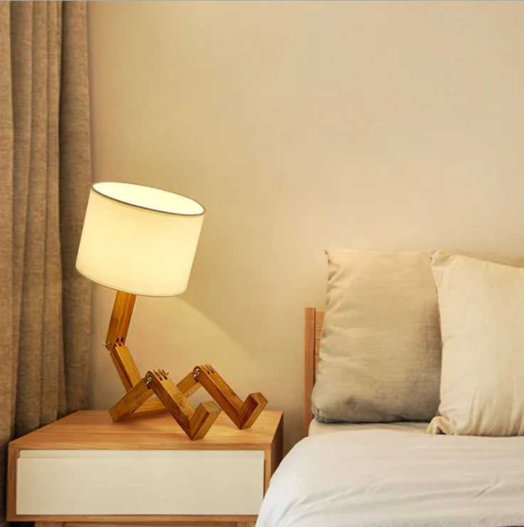Wooden Robot Desk Desk Lamp USB shown as soft ambient home lighting