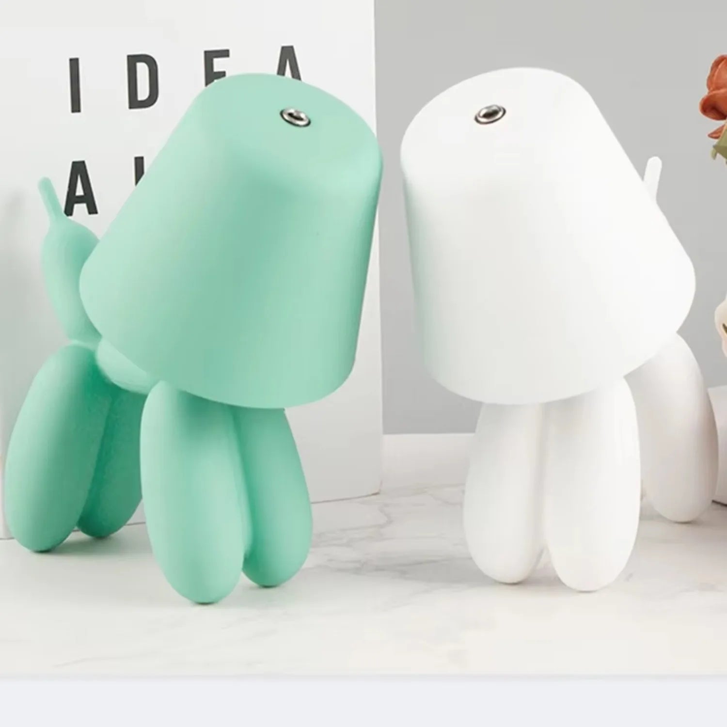 Quality Puppy Tri Bedside Table Lamp Rechargeable USB shown as soft ambient home lighting