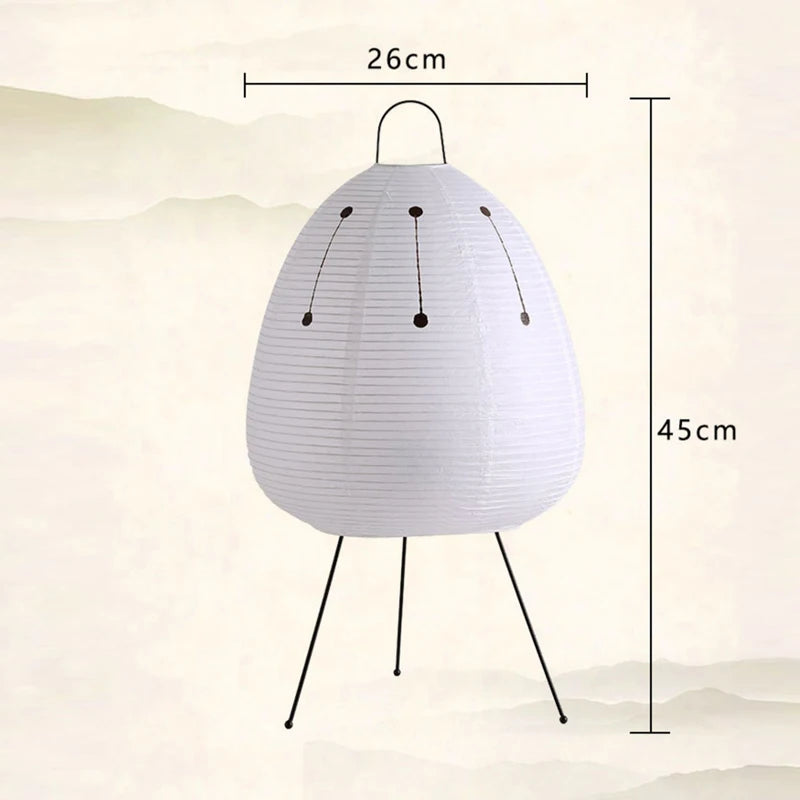 LED Modern Table Lamp Minimalist Hand Cradle Xuan Paper shown as soft ambient home lighting